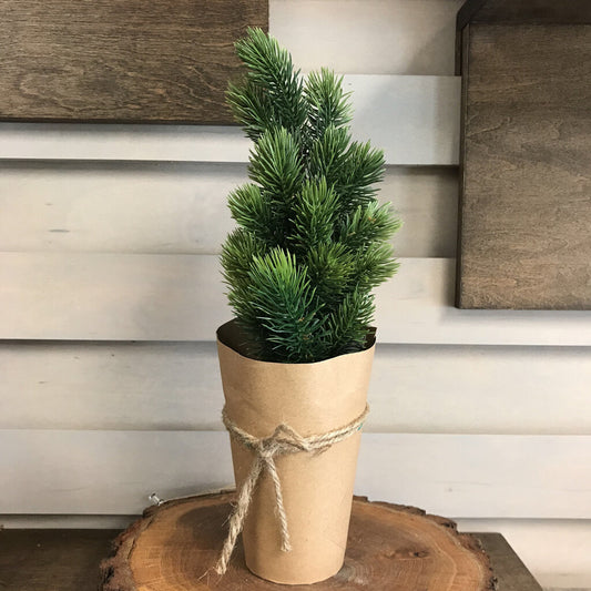 faux tree in paper pot